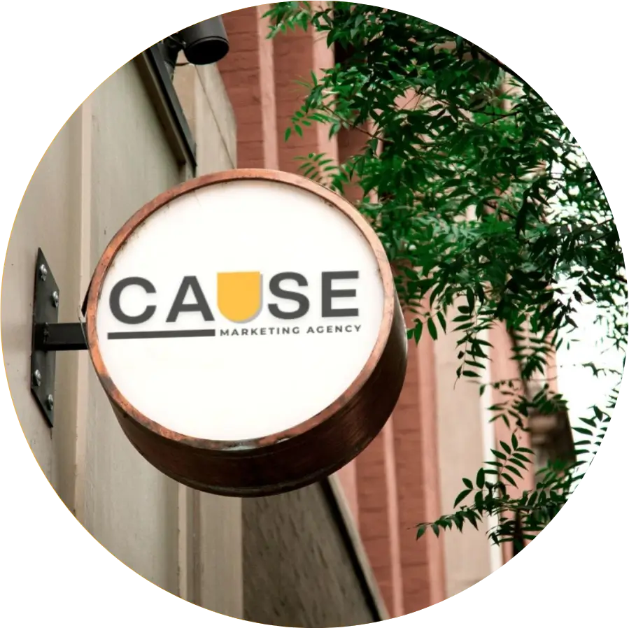 CAUSE Marketing Agency logo on a building, representing why we exist—to help Canadian businesses and nonprofits be found, chosen, and supported for the long run