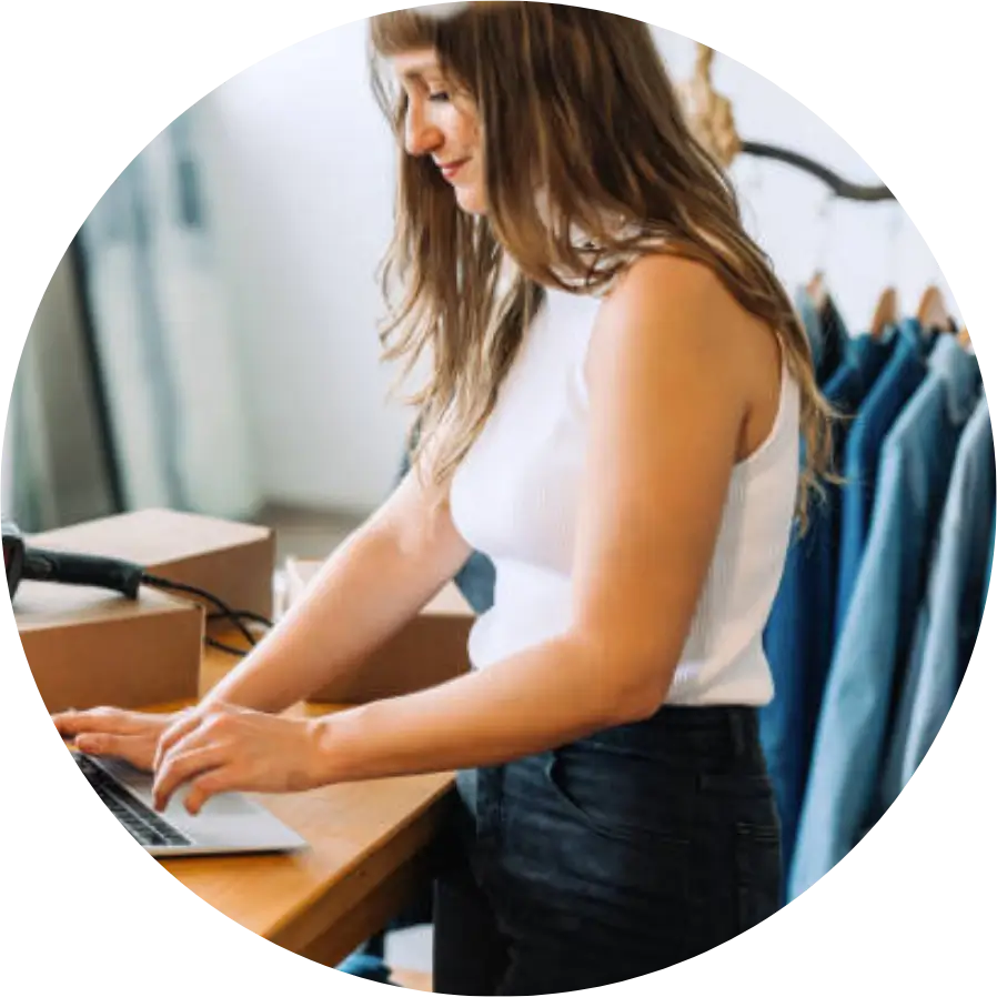 Happy Canadian business owner confidently running their business while AI PRO and their MarketingPRO handle search and follow-up.